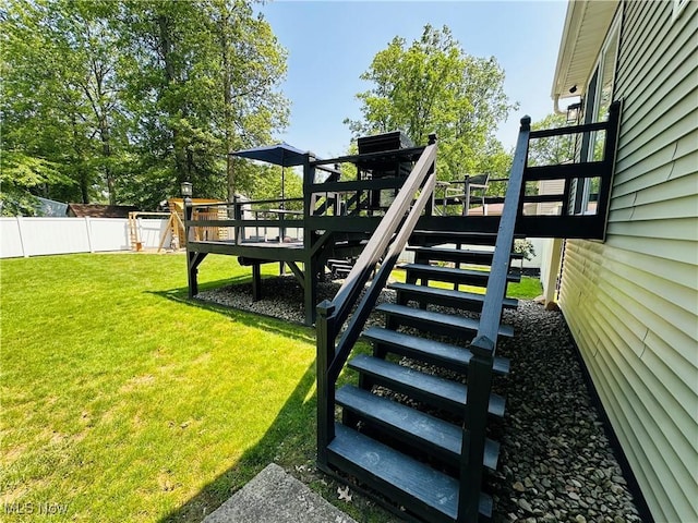 132 Dennis Dr, Cortland, OH 44410 - view of jungle gym featuring stairs and a wooden deck
