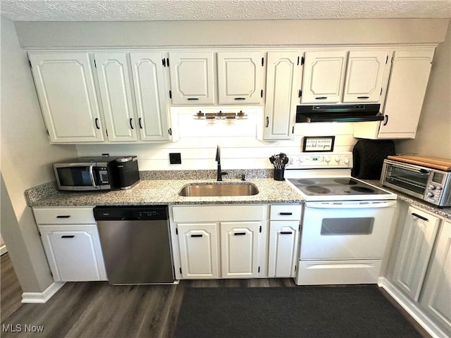 132 Dennis Dr, Cortland, OH 44410 - kitchen featuring appliances with stainless steel finishes, ventilation hood, dark wood-style flooring, white cabinets, and a textured ceiling