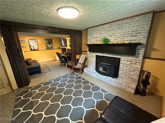 132 Dennis Dr, Cortland, OH 44410 - living room with carpet, a wood stove, and a textured ceiling