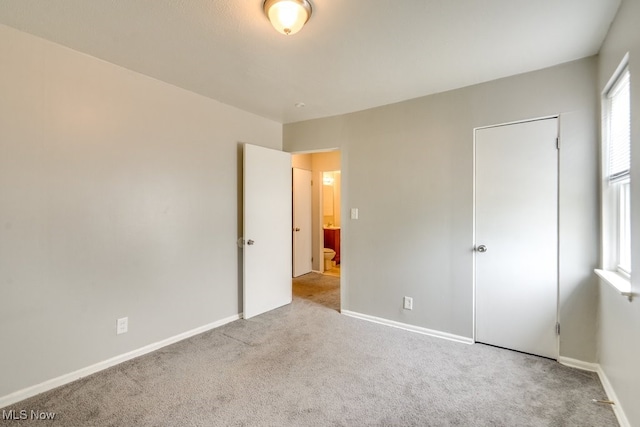 640 E 261st St, Euclid, OH 44132 - unfurnished bedroom featuring carpet floors