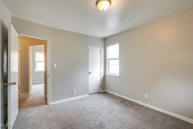 640 E 261st St, Euclid, OH 44132 - carpeted empty room with baseboards