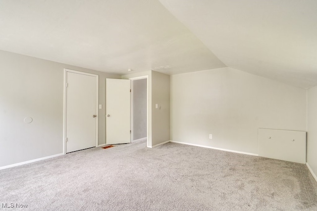 640 E 261st St, Euclid, OH 44132 - additional living space with light carpet and vaulted ceiling