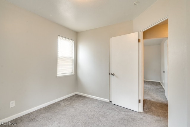 640 E 261st St, Euclid, OH 44132 - unfurnished bedroom featuring carpet flooring