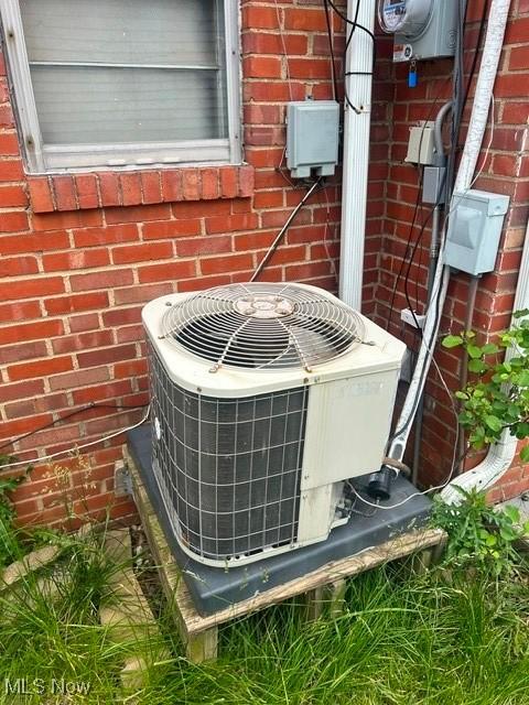 640 E 261st St, Euclid, OH 44132 - exterior view of a cooling unit and brick siding