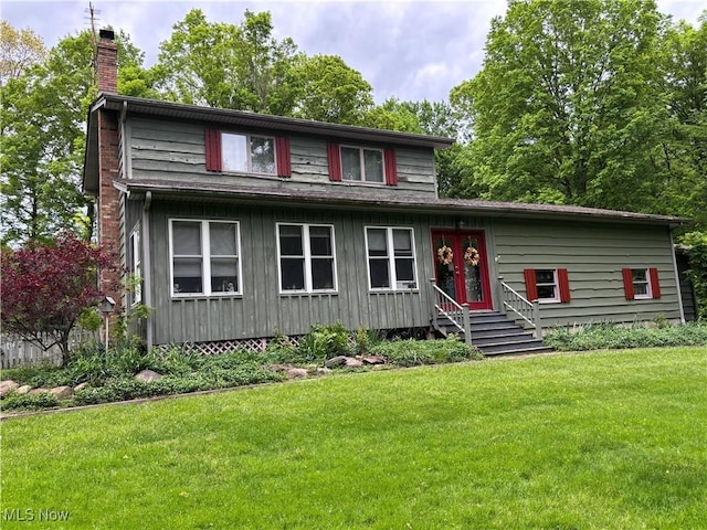38474 Longs Crossing Rd, Leetonia, OH 44431 - view of front of property featuring a chimney, entry steps, and a front lawn