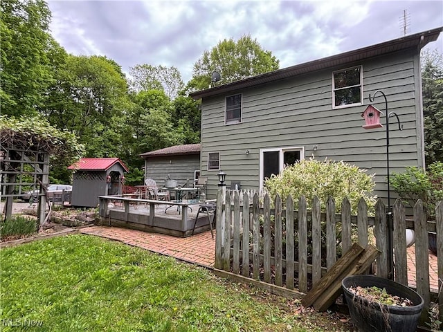 38474 Longs Crossing Rd, Leetonia, OH 44431 - back of property featuring a shed, a deck, and a patio