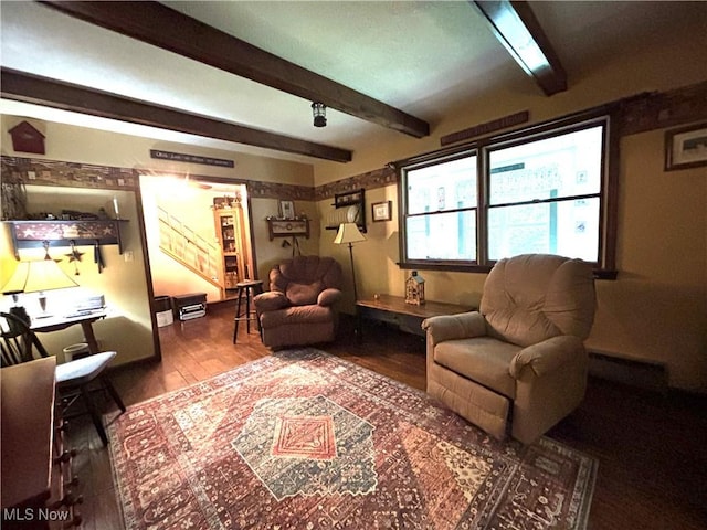 38474 Longs Crossing Rd, Leetonia, OH 44431 - living area with baseboard heating, beam ceiling, wood finished floors, and stairs