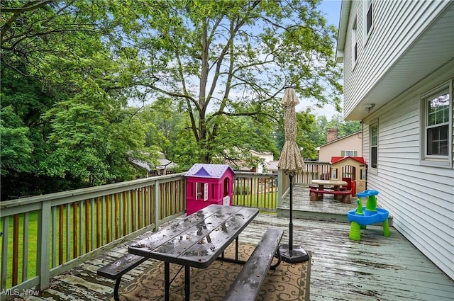 7436 Crory Rd, Canfield, OH 44406 - deck featuring outdoor dining space and view of scattered trees