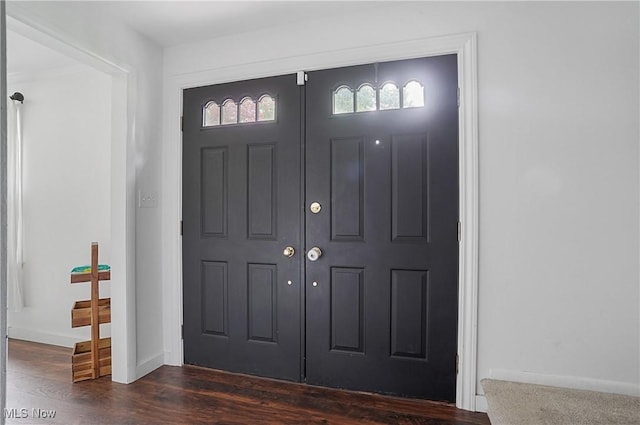 7436 Crory Rd, Canfield, OH 44406 - foyer featuring dark wood-type flooring and baseboards