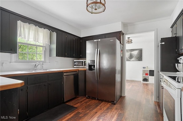 7436 Crory Rd, Canfield, OH 44406 - kitchen with stainless steel appliances, dark wood-style floors, light countertops, and dark cabinetry