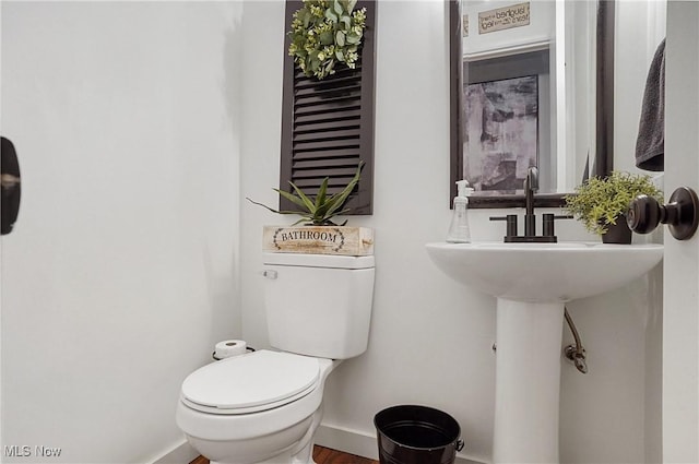 7436 Crory Rd, Canfield, OH 44406 - bathroom featuring baseboards and wood finished floors