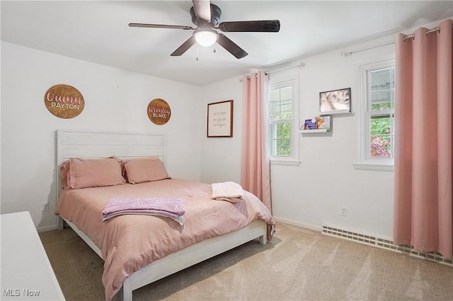 7436 Crory Rd, Canfield, OH 44406 - bedroom featuring carpet, baseboard heating, and a ceiling fan