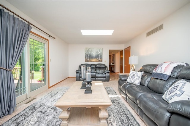 3661 Meander Reserve Cir, Canfield, OH 44406 - carpeted living room with a skylight and baseboards