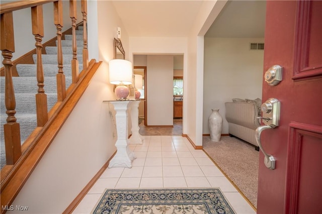 3661 Meander Reserve Cir, Canfield, OH 44406 - foyer entrance featuring light tile patterned floors and stairway