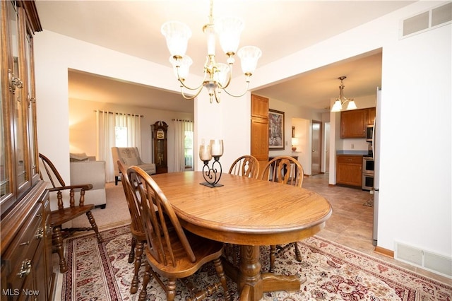 3661 Meander Reserve Cir, Canfield, OH 44406 - dining area featuring a chandelier