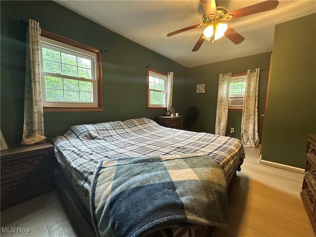 5130 Winfield St NE, East Canton, OH 44730 - bedroom with ceiling fan and wood finished floors