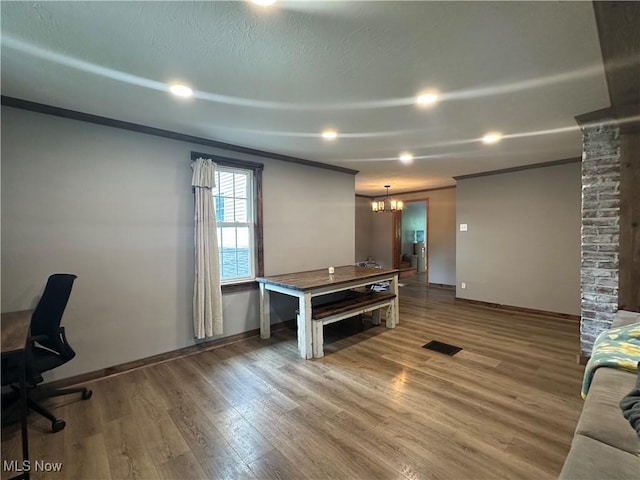 5130 Winfield St NE, East Canton, OH 44730 - unfurnished office with crown molding, wood finished floors, and a chandelier