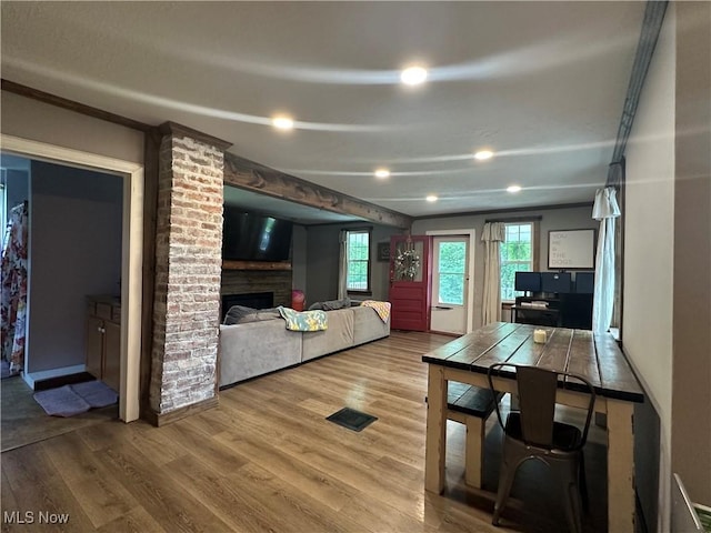 5130 Winfield St NE, East Canton, OH 44730 - living room featuring wood finished floors, a fireplace, and recessed lighting