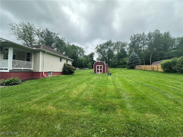 5130 Winfield St NE, East Canton, OH 44730 - view of grassy yard featuring a shed