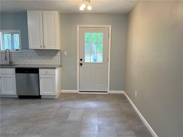 5482 Pleasant St, North Ridgeville, OH 44039 - entryway featuring a sink and a textured ceiling