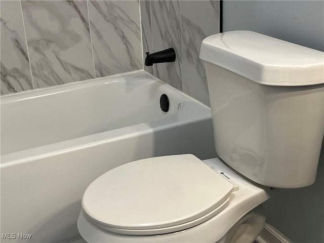5482 Pleasant St, North Ridgeville, OH 44039 - bathroom featuring a tub to relax in and toilet