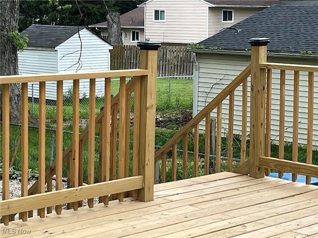 5482 Pleasant St, North Ridgeville, OH 44039 - deck featuring a fenced backyard and stairs