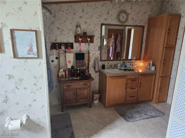 1947 N Vinegar Hill Rd NE, Mcconnelsville, OH 43756 - bathroom with wallpapered walls and vanity