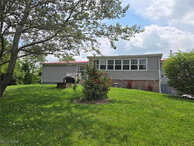 1947 N Vinegar Hill Rd NE, Mcconnelsville, OH 43756 - rear view of property with a yard