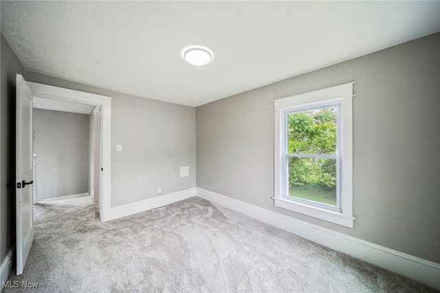 1115 W 43rd St, Ashtabula, OH 44004 - carpeted spare room with baseboards