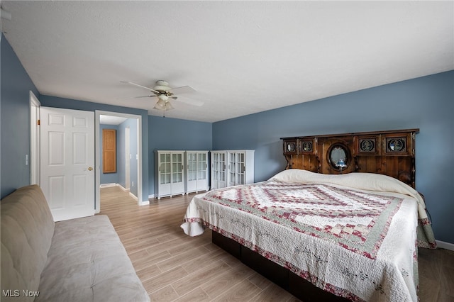 5802 Redwood Ct, Mentor-On-The-Lake, OH 44060 - bedroom featuring wood finished floors and ceiling fan