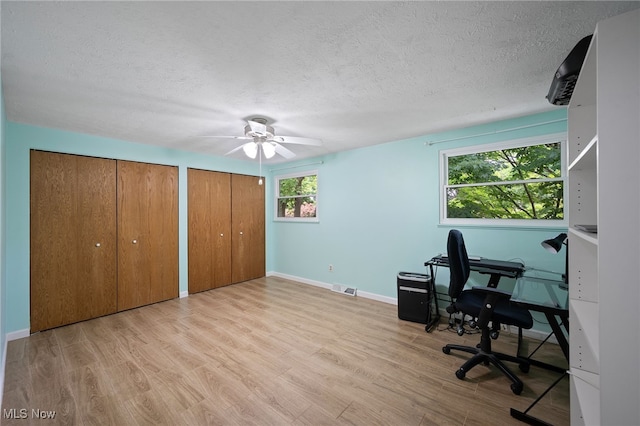 5802 Redwood Ct, Mentor-On-The-Lake, OH 44060 - office area with a textured ceiling, wood finished floors, and ceiling fan