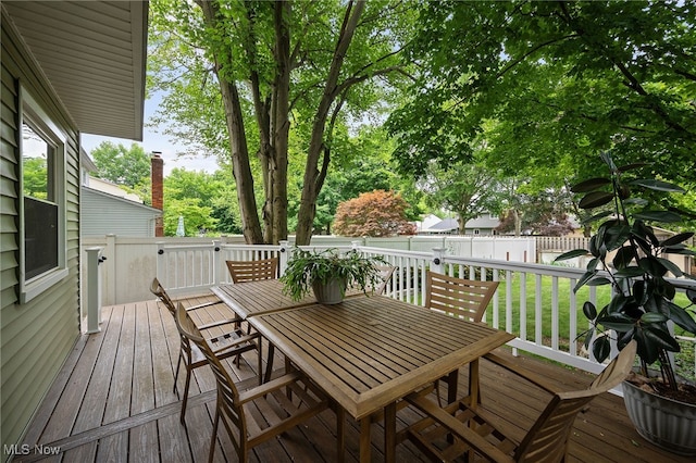 5802 Redwood Ct, Mentor-On-The-Lake, OH 44060 - wooden deck with a fenced backyard and outdoor dining area