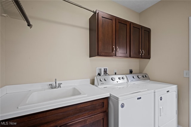 34782 Legends Way, Grafton, OH 44044 - laundry area featuring cabinet space and washer and clothes dryer