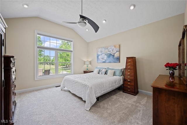 34782 Legends Way, Grafton, OH 44044 - carpeted bedroom with vaulted ceiling, a textured ceiling, a ceiling fan, and recessed lighting