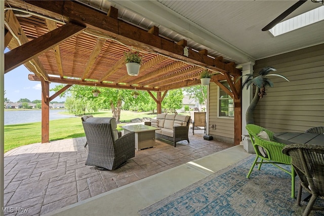 34782 Legends Way, Grafton, OH 44044 - view of patio / terrace with outdoor lounge area, a pergola, and a water view