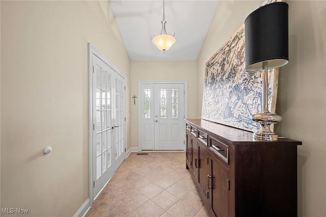 34782 Legends Way, Grafton, OH 44044 - entrance foyer featuring light tile patterned floors and vaulted ceiling