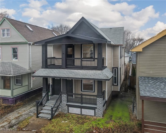 1851 W 52nd St, Cleveland, OH 44102 - view of front facade with a balcony, covered porch, and a shingled roof