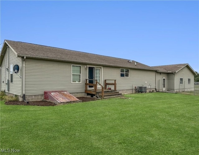 4182 Reger Rd, Conneaut, OH 44030 - back of house featuring a lawn