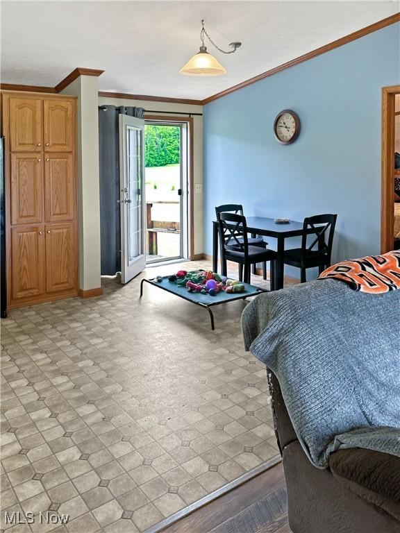 4182 Reger Rd, Conneaut, OH 44030 - bedroom with ornamental molding and access to exterior