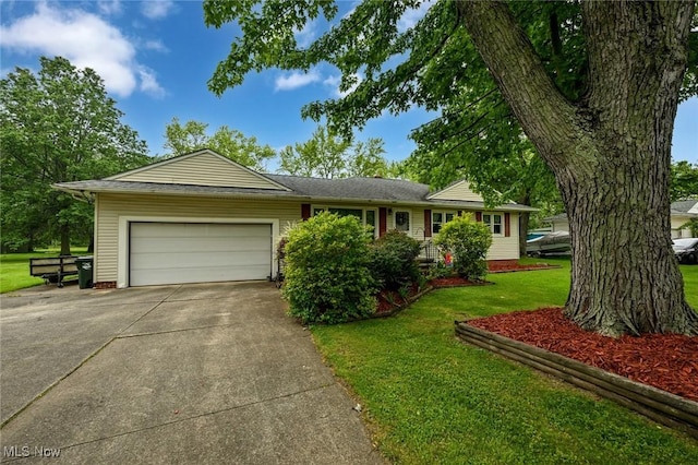12022 Albion Rd, North Royalton, OH 44133 - ranch-style house featuring a garage, driveway, and a front lawn