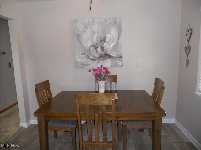 374 Clarmont Rd, Willowick, OH 44095 - dining area with wood finished floors and baseboards
