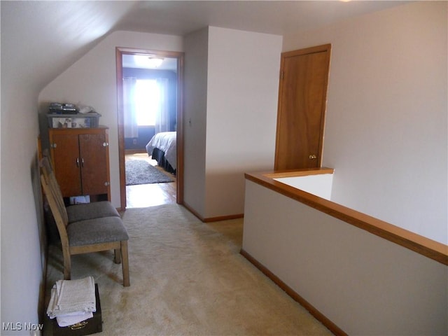 374 Clarmont Rd, Willowick, OH 44095 - hall featuring light colored carpet and vaulted ceiling