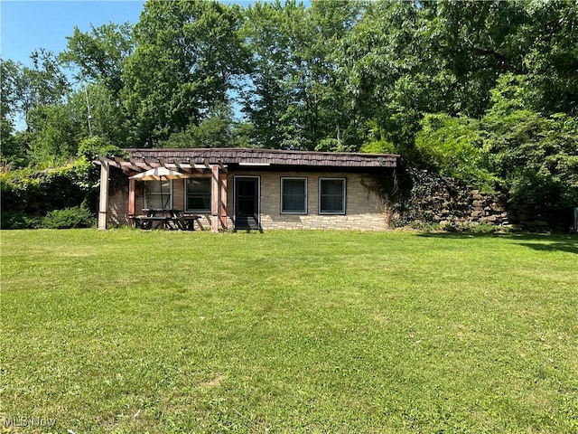 382 Bluestone Dr, Weirton, WV 26062 - view of front of property featuring a front yard, a pergola, and concrete block siding