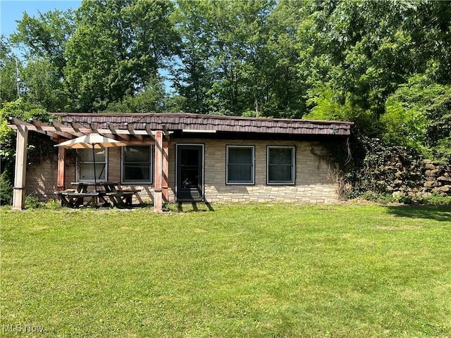 382 Bluestone Dr, Weirton, WV 26062 - view of front facade featuring a pergola, a front yard, and stone siding