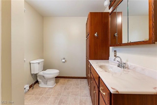 119 5th St SW, Strasburg, OH 44680 - half bathroom with vanity and tile patterned floors