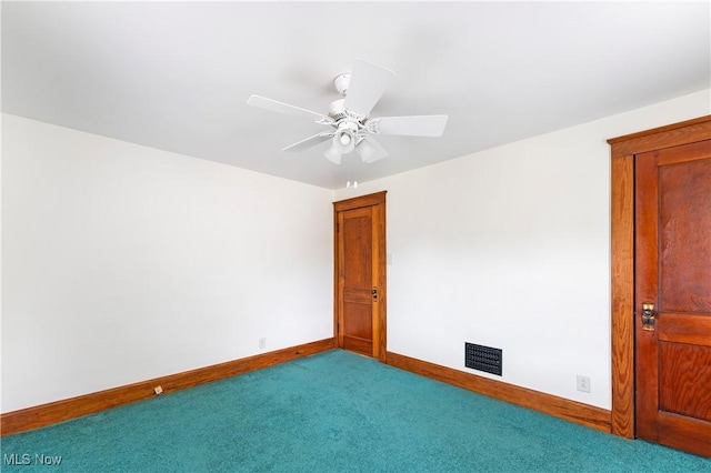119 5th St SW, Strasburg, OH 44680 - empty room featuring carpet flooring and ceiling fan