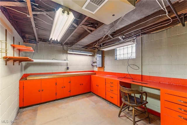 119 5th St SW, Strasburg, OH 44680 - basement featuring a workshop area and electric panel