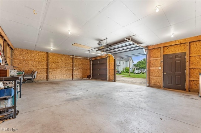 119 5th St SW, Strasburg, OH 44680 - garage with a garage door opener