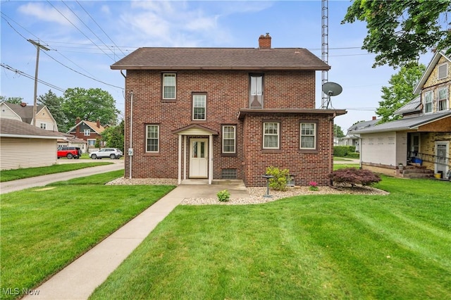 119 5th St SW, Strasburg, OH 44680 - view of front of property with brick siding, a chimney, a front yard, and roof with shingles
