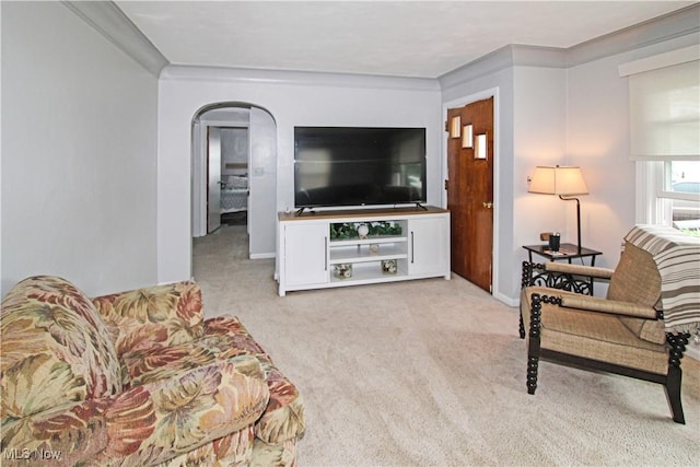 517 Linwood Ct, Port Clinton, OH 43452 - carpeted living room with crown molding and arched walkways